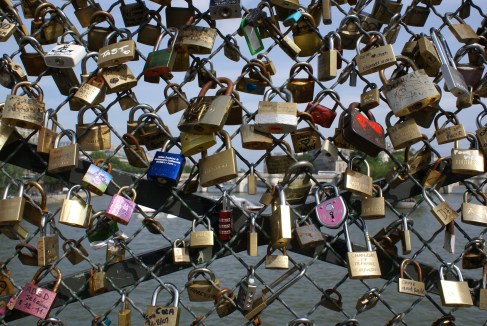 Locks placed by besotted couples on the Pont des Arts across the Seine. Paris May 31, 2012 Image