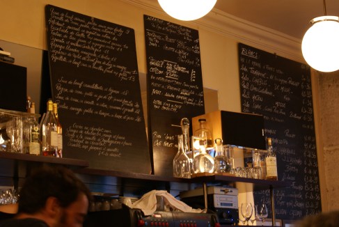 Le Baratin restaurant's wine and dinner menus above the bar. Paris May 31, 2012 Image