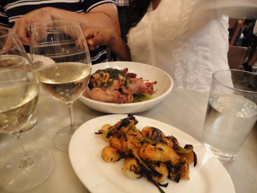 Prune's roast chicken with salsa verde, and charred green onions. The wine is Greek, and the people are my Canadian friend and her Brooklyn husband. Sept 1, 2013.